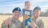 PVT Fa’amagalo Tanu and PVT Sene Jr Isileli with their nephew Jelsen