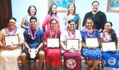 Chairwoman of the McDonald's American Samoa Scholarship Program, Dolores Tautolo (standing 2nd from left) with other the board members and scholarship recipients