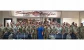 Amata with troops at airport