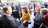 Kate Kelly, center, founder of Ordain Women, with a group of more than 150 women denied entrance to an all-male meeting of Mormon priesthood holders in Oct. 2013. (Rick Bowmer/ AP) Kate Kelly, center, founder of Ordain Women