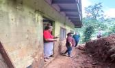 mudslide shoveled away from house