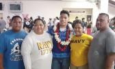 John Leulu with his parents and siblings