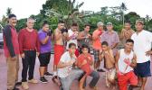 Seen here are local boxing officials with some of the new boxers, who may just fulfill their dreams of becoming future champions for American Samoa. See story for full details.  [photo: AF]