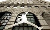 In this Sept. 29, 2009 file photo, the famous Nike Michael Jordan image graces the front of the Niketown store in downtown Portland, Ore. Basketball legend Michael Jordan is not leaving the Nike Inc. board of directors and his namesake brand, the Air Jordan sneaker, remains with the sports shoe and apparel company. Jordan has never sat on the Nike board of directors, said Mitch Germann, a spokesman for Jordan Brand, which Nike owns. The false claim, which originated on an online satire site, began circulating widely after Nike’s launch of a new ad campaign featuring former San Francisco 49ers quarterback Colin Kaepernick. (AP Photo/Don Ryan, File) The famous Nike Michael Jordan image graces the front of the Niketown store in downtown Portland, Ore