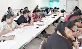 Participants in one of the classes for Notary Public certification