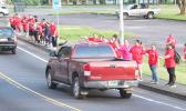 Some of the nurses and their supporters waiving yesterday morning in front of Fagaalu Park