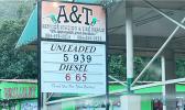 Gasoline prices posted at a Nuuuli gas station