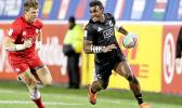 New Zealand’s Akuila Rokolisoa scores against Canada