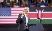 In this July 26, 2015 file photo, President Barack Obama delivers a speech in front of U.S. and Kenyan flags at the Safaricom Indoor Arena in the Kasarani area of Nairobi, Kenya. On Friday, June 29, 2018, The Associated Press has found that stories circulating on the internet that Obama visited his father’s birthplace on a secret trip to Kenya in June 2018 are untrue. (AP Photo/Ben Curtis) Associated Press file photo of former President Obama