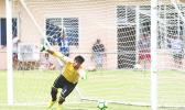 Goalkeeper for Lupe o le Soaga watches helplessly as the winning goal for Tupapa Maraerenga FC rolls past him during a penalty kick that came late in the second half of their match. Tupapa Maraerenga FC defeated Lupe o le Soaga 1 - 0. [photo: TG]