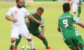 Suliasi Lauhoua (14) of Veitongo FC trying to defend against Michael Fifi’i of Lupe ole Soaga during the opening half of their match up last Friday afternoon. Veitongo FC lost 6 - 0 against the Samoans. [photo: TG]