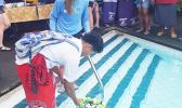 OJ Bartley of Faga'itua High School getting his hands and feet wet