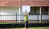  Moira Maiava holding her one woman protest for better health care