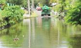 Pumper truck pumping out water at Fatuoaiga/Ottoville road