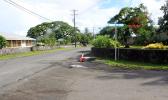 This Samoa News photo taken around 4p.m. last Friday, shows a corner section of Ottoville Road covered with gravel.
