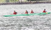 Paddlers in an outrigger canoe