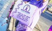 Some of the local residents, all dressed in purple at Alzheimer's month wave