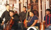 Some members of the Samoa National Orchestra with the Pate drum