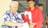 Petu Pouli of Vaiala Tongan’s Boys 13-15 team receives his MVP award