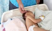 Young child in a hospital bed