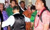 Prime Minister Tuilaepa surrounded by Samoans