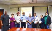  [l-r] Lt. Gov. Lemanu Palepoi Sialega Mauga, Port Administration director Taimalelagi Dr. Claire Poumele, Port employee Sunia Davetawalu, Port employees Timoci Loloma, Gov. Lolo Matalasi Moliga, Harbor Master Silila Patane, Port employee Joseph Fa’agata, and Port Administration deputy director Chris King, yesterday morning at the Governor’s Office Conference room at the conclusion of a brief recognition ceremony. (See story inside for details of the quick actions of the 3 Port employees that saved Patane’s