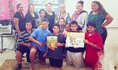 People participating in Lupelele Elementary’s Read Aloud program