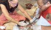Master Tufuga Su’a Tupuola Fitiao practicing his art, assisted by ASCC Fine Arts Professor Regina Meredith Fitiao who is also his wife