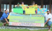 Local members of the group Tagata Tutu Faatasi Alliance of American Samoa