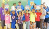 Faleasao Elementary School kids with their dictionaries and Rotarians