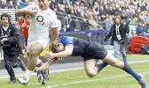 This is a Sunday, March 11, 2012 file photo of England's Manu Tuilagi, left, as he runs to score a try despite the tackle of France's Aurelien Rougerie during their six nations rugby union match at the Stade de France stadium, in Saint Denis, outside Paris, Sunday. England's Rugby Football Union said Monday Aug. 7, 2017 that Manu Tuilagi and Denny Solomona have been sent home from a national team training camp. An RFU statement says the disciplinary action is a result of "culture issues" with no further explanation provided. (AP Photo/Christophe Ena/File) This is a Sunday, March 11, 2012 file photo of England's Manu Tuilagi, left, as he runs to score a try despite the tackle of France's Aurelien Rougerie during their six nations rugby union match at the Stade de France stadium, in Saint Denis, outside Paris, Sunday. England's Rugby Football Union said Monday Aug. 7, 2017 that Manu Tuilagi and Denny Solomona have been sent home from a national team training camp. An RFU statement says the disciplinary action is a result of "culture issues" with no further exp