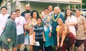 Former Associate Judge Siaki Logoai with his family, following the 8th grade graduation ceremony at the Home of the Flames last Thursday where his grandson Sam was one of 35 who received their diplomas. [photo: BC]