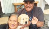 Tasi and Ioana Parker with their dog