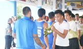 Samoana Sharks shake hands with Marist Crusaders after winning the Junior Varsity Basketball Division last Saturday morning at the Samoana High School Gymnasium in Utulei.  [photo: Ese Malala]