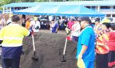 Gov. Lolo Matalasi Moliga, along with other ASG officials turning a shovel full of dirt.