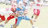 Samoana Sharks ball carrier is brought down near mid field by Joseph Umu (3)