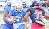 Samoana’s running back breaking out to center field and coming face-to-face with the Marist Crusader defensive backs