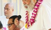 Le afioga le Usoali’i Muagututi’a Dr Vaiula Tuato’o ma timaiga i lona aiga atoa, “Ia Alofa le tasi i le tasi, ma ia nonofo fealofani!”  [ata: Leua Aiono Frost]