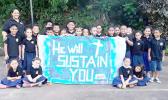 Samoa Baptist Academy 1st graders with their banner