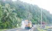 School bus spewing white smoke