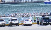 A look at the competition between Fuao from Vatia and Paepaeulupo’o of Aua as they pass in front of the main dock of Pago Pago Harbor, heading towards the finish line. Fauo i is the one closer to the dock side.  [photo: Fili Sagapolutele]