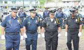 Seniors police officers parading during Police Week celebration earlier this year at Malaeoletalu in Fagatogo. DPS has a new established unit - the Training Division - which is set up to provide training for local police officers. See story for full details.  [photo: AF]