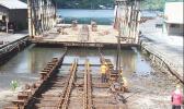 Ronald Reagan Shipyard employees working on repairs to the front portion of the 3,000-ton slipway last year. 