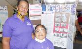 Semo Afalava with his science fair project