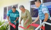 First Lady Cynthia Moliga (middle) cutting the ribbon last Friday to officially open the Pacific Sleep Care clinic, which treats sleep apnea. She is assisted by Health director Motusa Tuilema Nua (far left) and Pacific Sleep Care general manager Ferdie Salvador.[photo: AF]