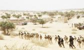 In this March 7, 2015, file photo, Chadian troops and Nigerian special forces participate in the Flintlock exercises with the U.S. military and its Western partners in Mao, Chad. The Pentagon told The Associated Press on Oct. 27, 2017, that there is no truth to claims in a viral story that Sgt. La David Johnson betrayed his fellow soldiers in an ambush that killed him and three of his comrades in Niger earlier this month. (AP Photo/Jerome Delay, File) In this March 7, 2015, file photo, Chadian troops and Nigerian special forces participate in the Flintlock exercises with the U.S. military and its Western partners in Mao, Chad. The Pentagon told The Associated Press on Oct. 27, 2017, that there is no truth to claims in a viral story that Sgt. La David Johnson betrayed his fellow soldiers in an ambush that killed him and three of his comrades in Niger earlier this month. (AP Photo/Jerome Delay, File)