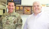 Neil Woolf (right) with Sgt. First Class Nick Marshall