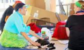 Local pet owners chat while awaiting the recovery of their pets
