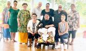 Alofaeleuma Faualo with his new wheel chair and supporters