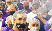 StarKist workers wearing purple
